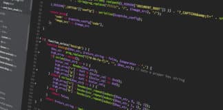 Lines of software code programming fill a computer monitor.