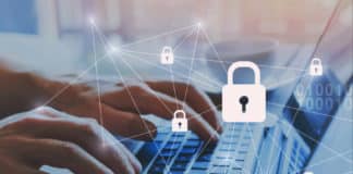 Cybersecurity software protects data an employee inputs into a laptop and a network.