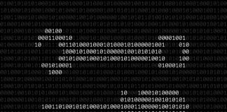 Silhouette of wrench and screwdriver made from binary symbols.