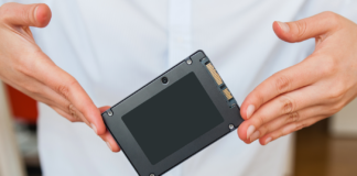 Man holding a new flash SSD in hands.