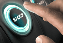 Hand about to press a Backup ins