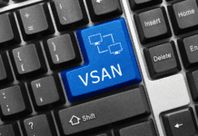 Custom blue key with VSAN inscription on a keyboard.