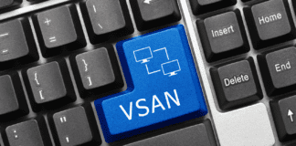 Custom blue key with VSAN inscription on a keyboard.